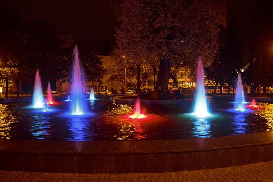 fountain with colorful LED-lit water jets fountain with colorful LED-lit water jets
