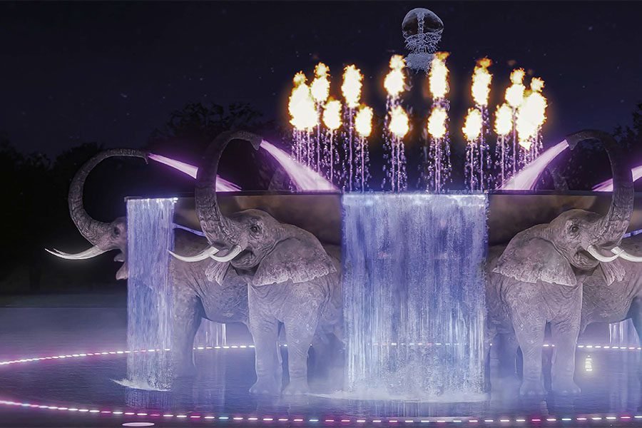 art and water installation with lighting elephant sculpture in the waterfall feature