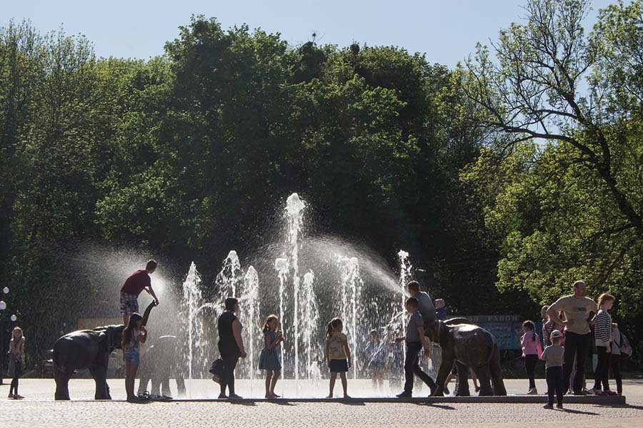 Interactive dry-deck fountain installation for urban park design and public space activation Interactive public fountain in city park