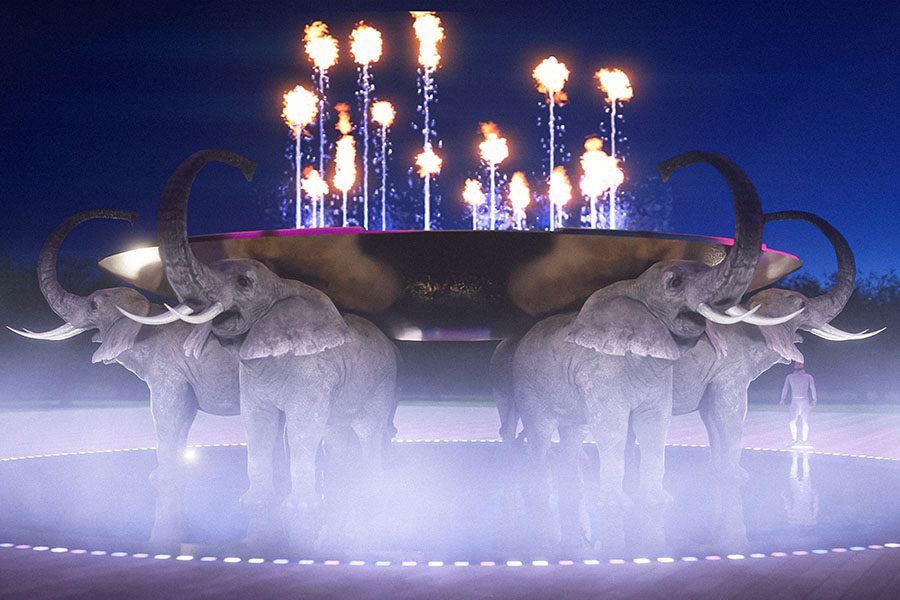 elephants holding large bowl with water elephants holding large bowl