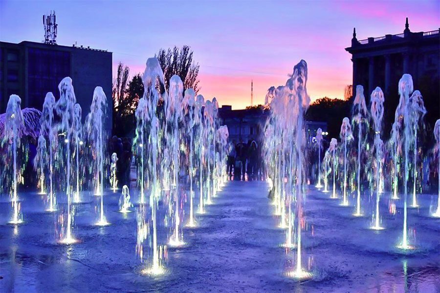 Interactive LED fountain with vertical water jets and multicolor lighting for city square interactive LED fountain