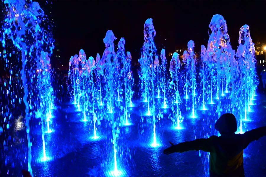 interactive water jets illuminated with blue light for public plaza water jets illuminated with blue light