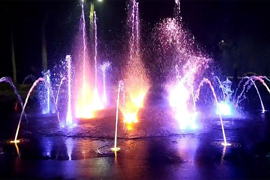 public fountain with water and light show water and light show at night