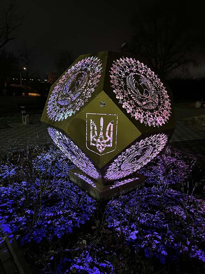 Handcrafted Gold Sculpture – custom geometric metal art installation with intricate perforated details for outdoor display handcrafted gold metal geometric public art installation
