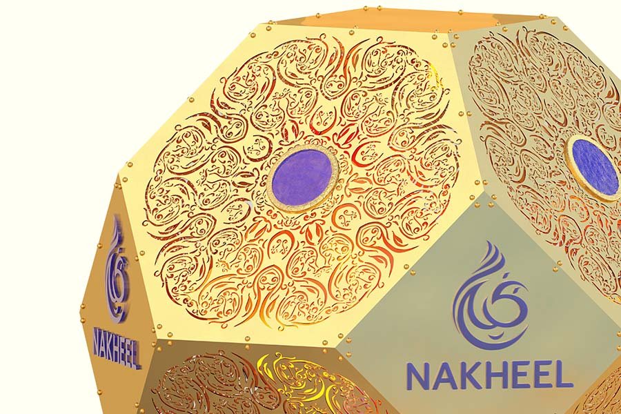 gold metal perforated sculpture with traditional patterns and blue logo branding perforated metal custom art sculpture for shopping center interior