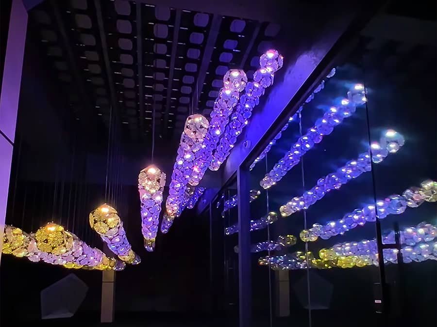 moving light pendants with purple and yellow color light