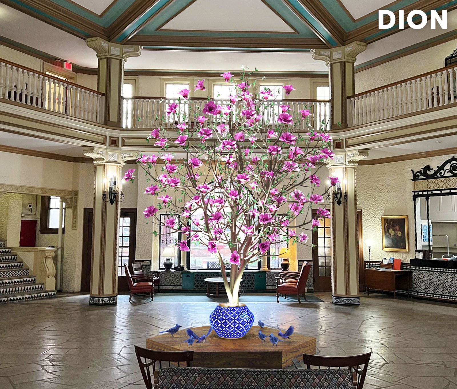art installation tree with pink flowers in blue vase