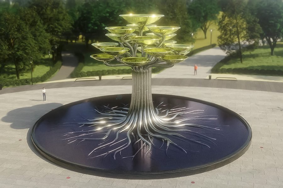 multi-tier bowl fountain with sculptural metal base in circular water basin