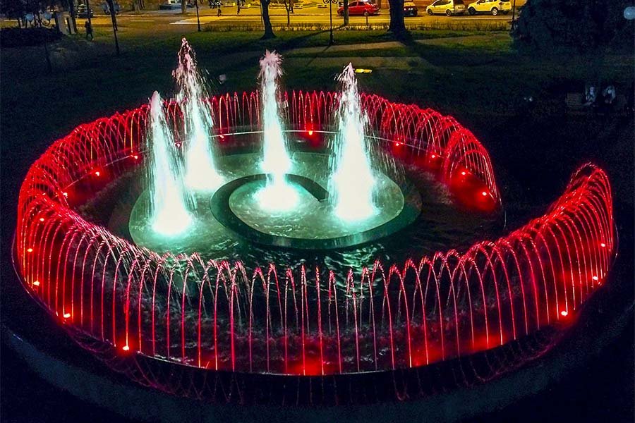 snail shape public fountain with red LED light