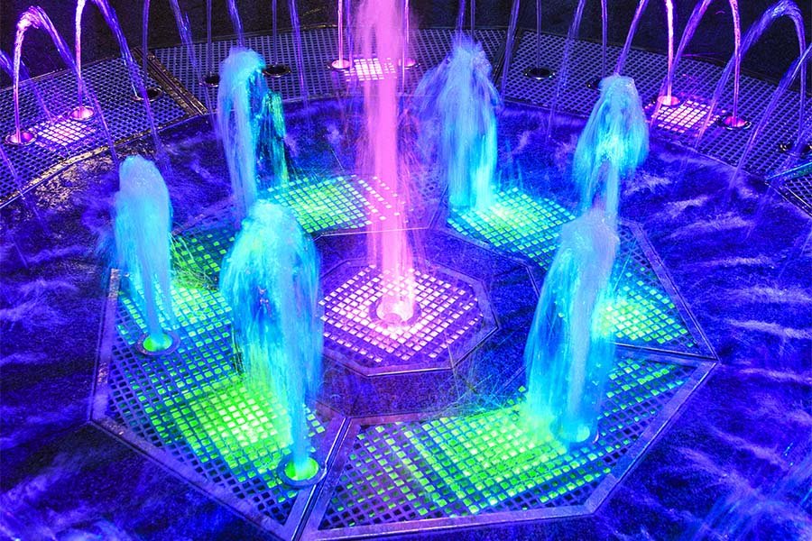 Interactive dry deck fountain