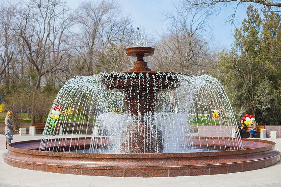 Classic tiered stone fountain with cascading water