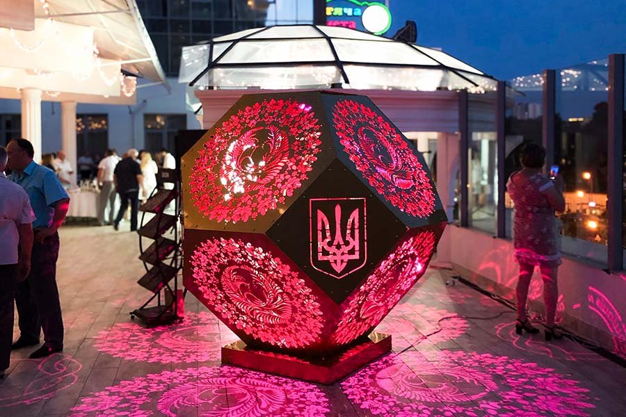 LED art installation with projection lights and traditional Ukrainian ornament