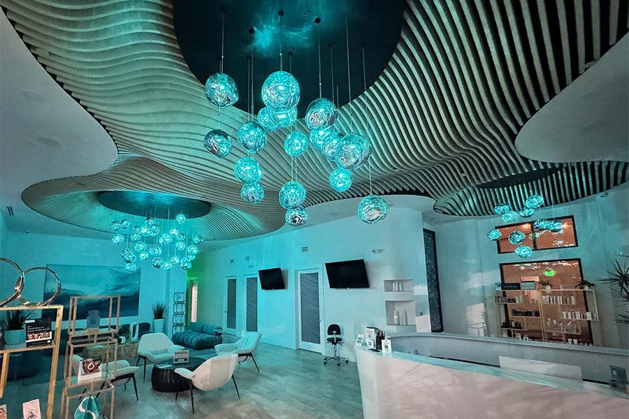 hanging turquoise glass lights on wave panels