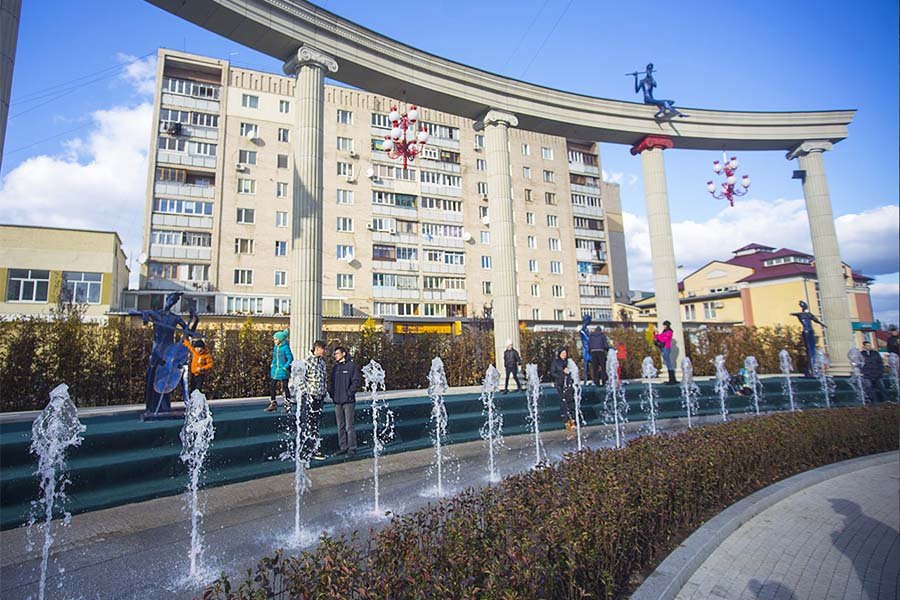 public linear fountain with water jets