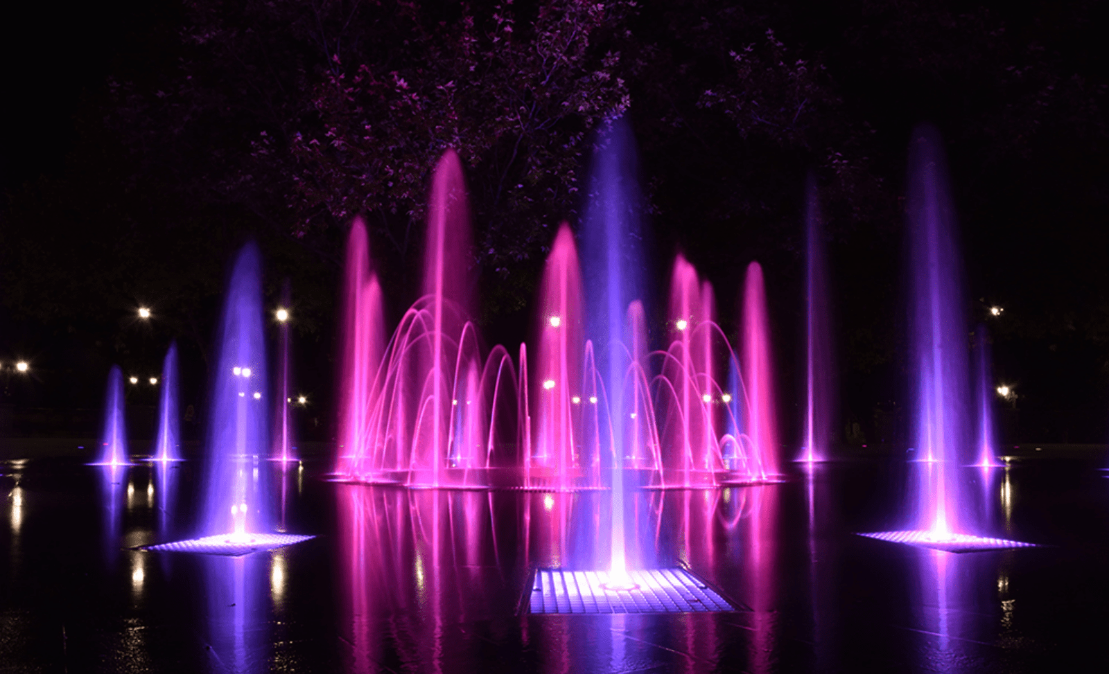 public fountain with color-changing lighting