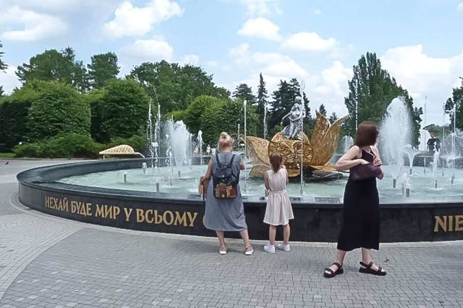 water basin with central sculptural fountain installation