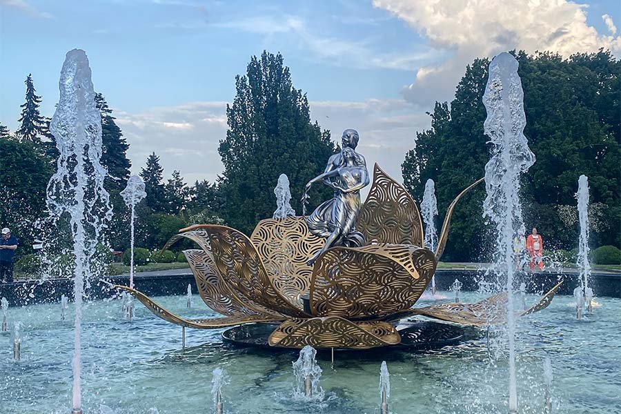 metal art lotus installation in the center of Fountain