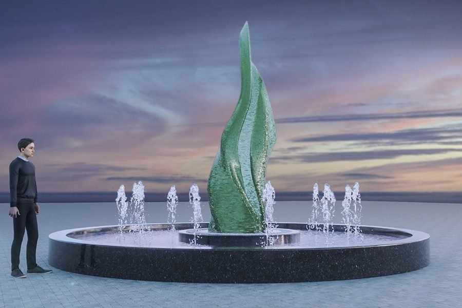 large glass abstract sculpture with water jets