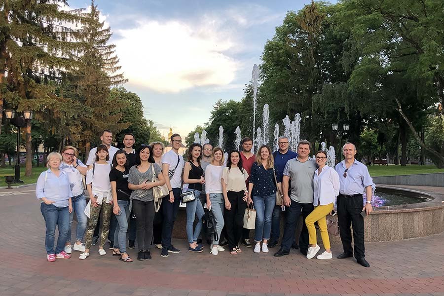 group of people in front of fountain