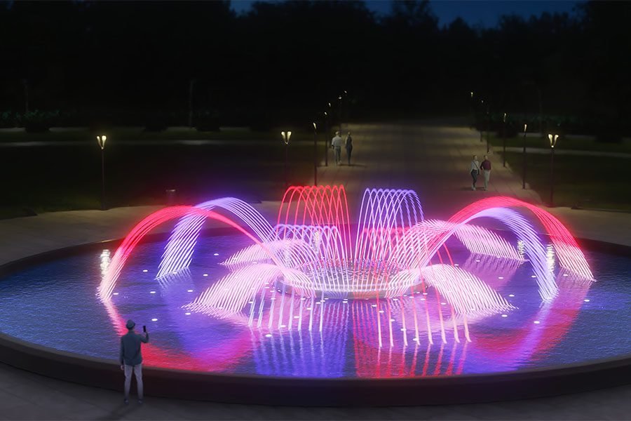 Colorful night fountain with dynamic light arcs and water choreography