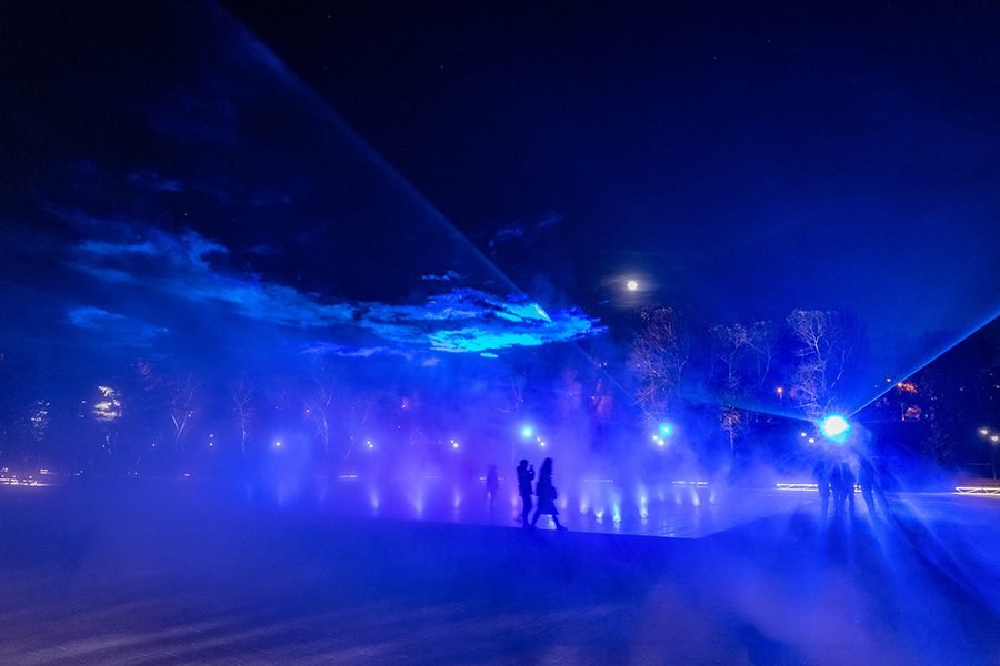 Fog and light installation on interactive fountain