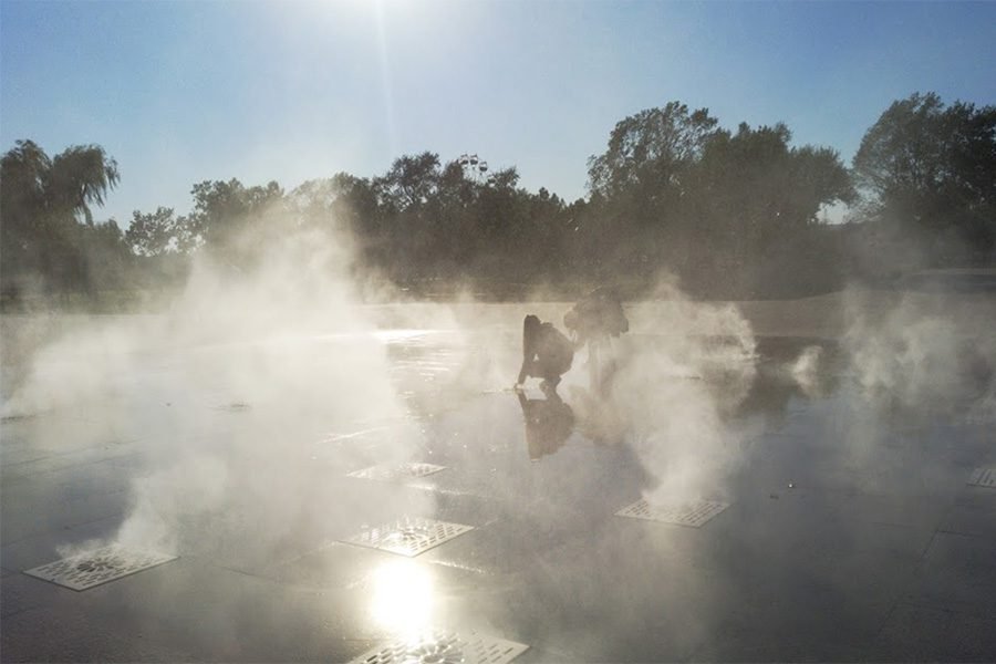 Interactive dry fountain with mist effects