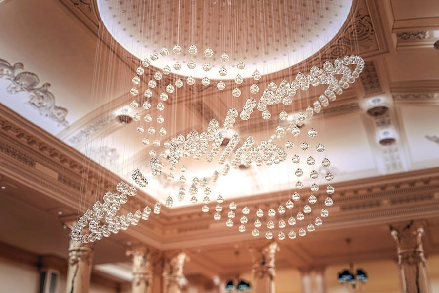 Elegant glass-drop chandelier installation