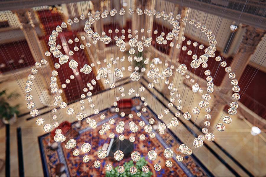 Kinetic crystal chandelier with cascading glass drops