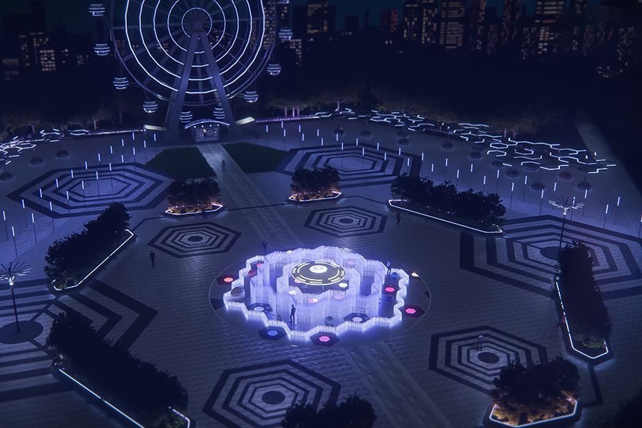 UFO themed light fountain installation at night