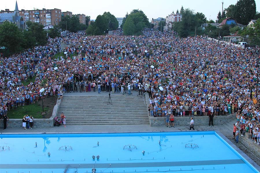 people in front of water fountain