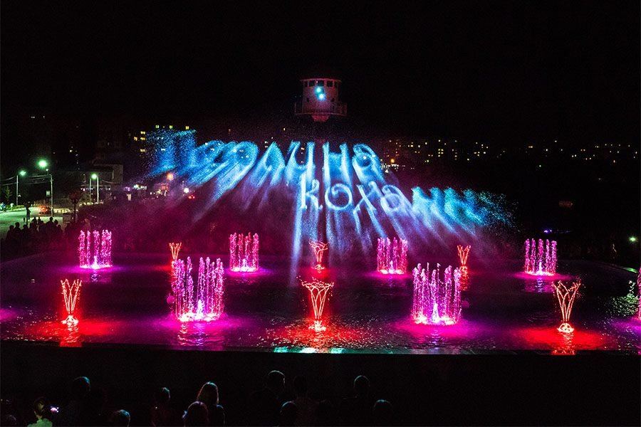 Water screen projection show with LED musical fountain at night