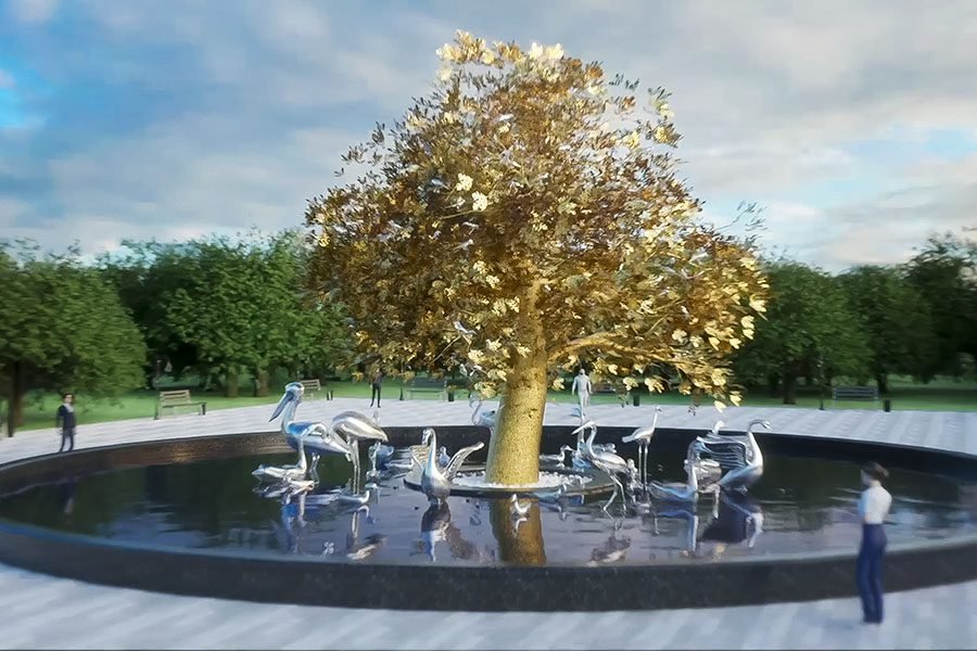 golden tree fountain with silver bird sculptures