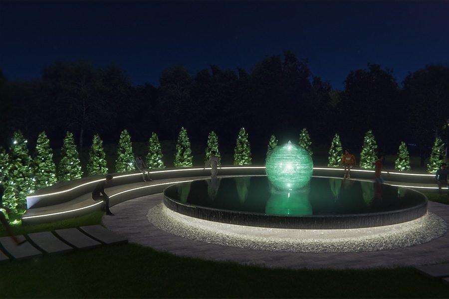 modern glowing sphere fountain installation at night