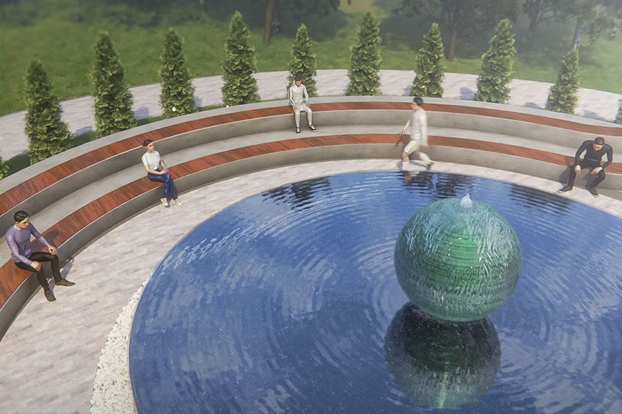spherical water feature in circular fountain