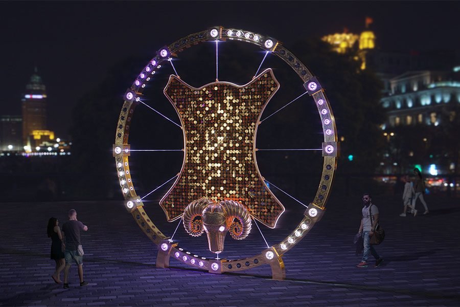 illuminated gold circular art sculpture