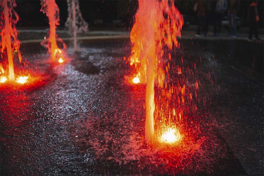 water jet in fountain with lighting