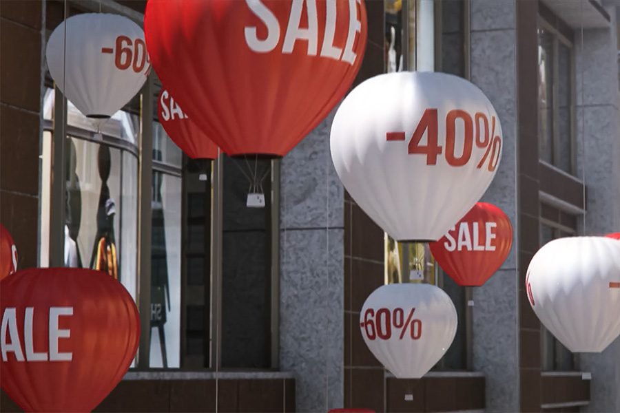 large kinetic SALE balloon display outside Miami shopping mall