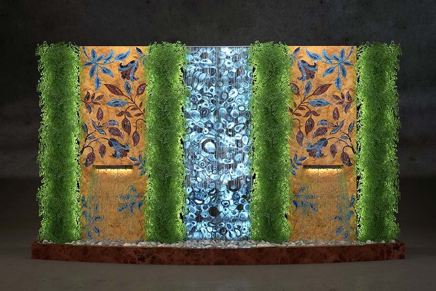real stone and glass interior fountain wall with integrated greenery