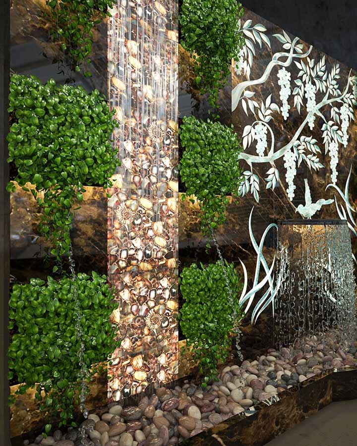 indoor lobby water feature with stone carving and cascading water