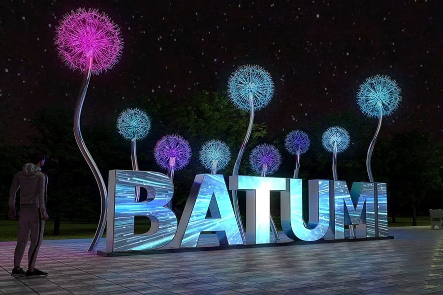 city sign with integrated projection screen and dynamic light display