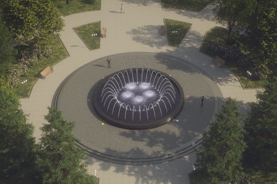 outdoor circular musical fountain with lights in public park