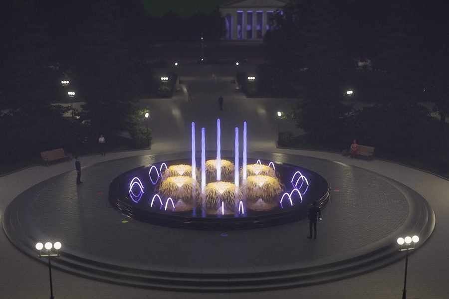 night illuminated musical fountain in public park