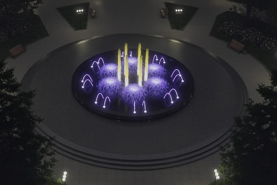 circular fountain night light show in outdoor park