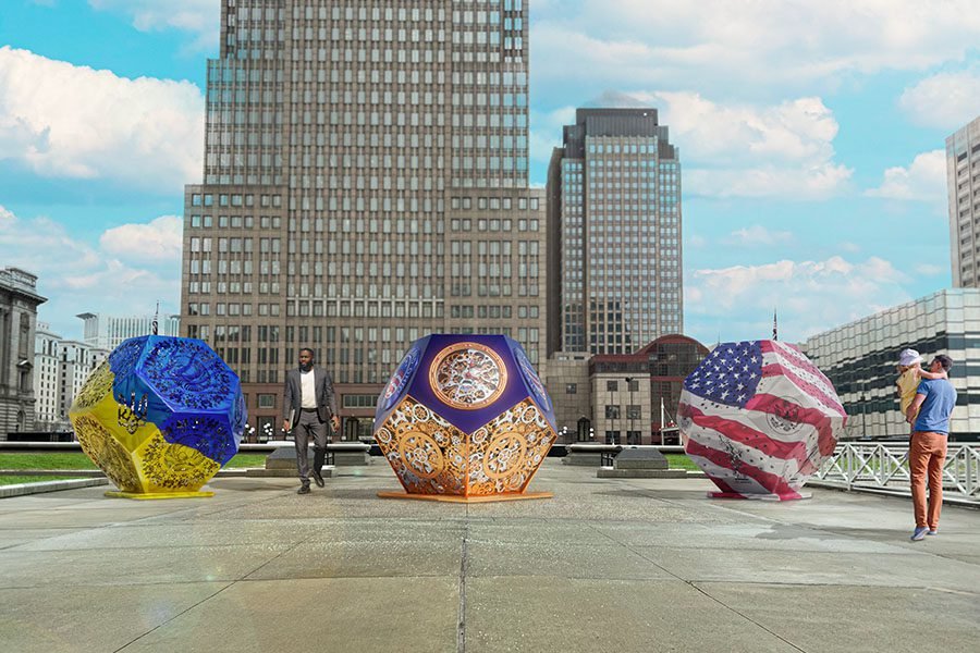 outdoor metal geometric sculptures with national flag designs in city plaza