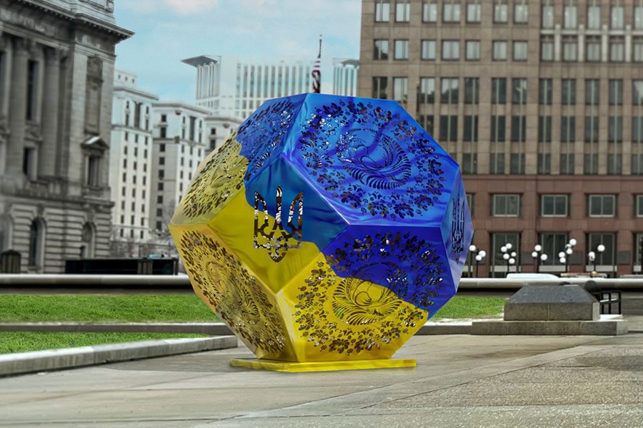 Ukrainian flag geometric sculpture — outdoor metal public art installation