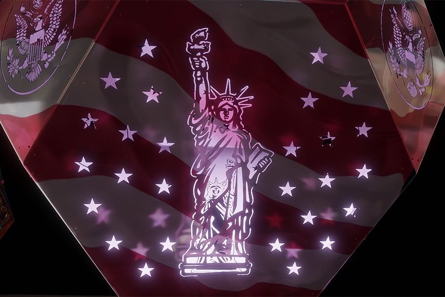 illuminated metal sculpture with Statue of Liberty and American flag design