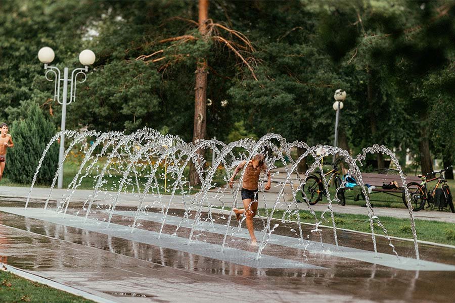 Arched water fountain in public park