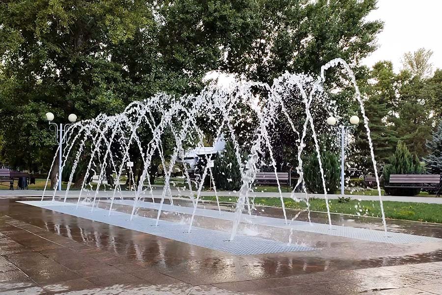 playful water arc installation