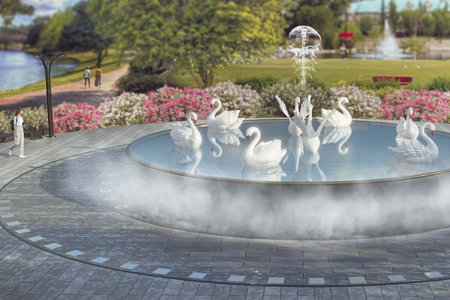 circular lake with swans and mist fountain effect