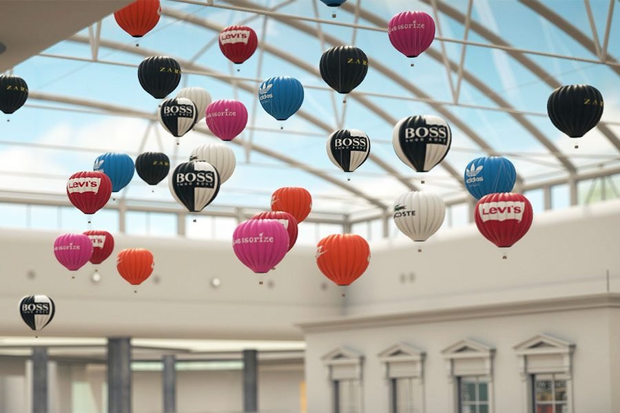 kinetic branded sphere installation featuring fashion labels